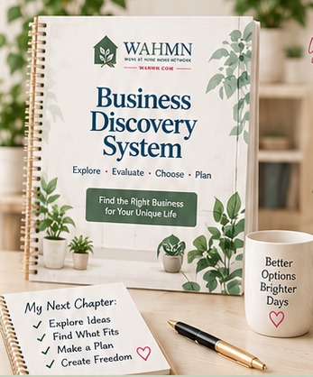 Business Discovery System workbook standing on a desk beside a notebook, pen and mug in a plant-filled home office